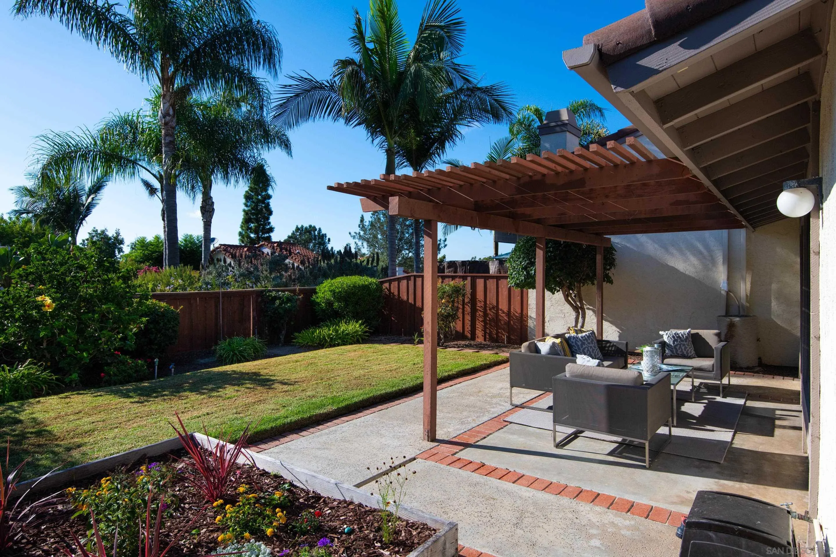 2002 Leafwood Place Encinitas, CA 92024 - Photo 31 of 64 a view of a backyard with plants and patio