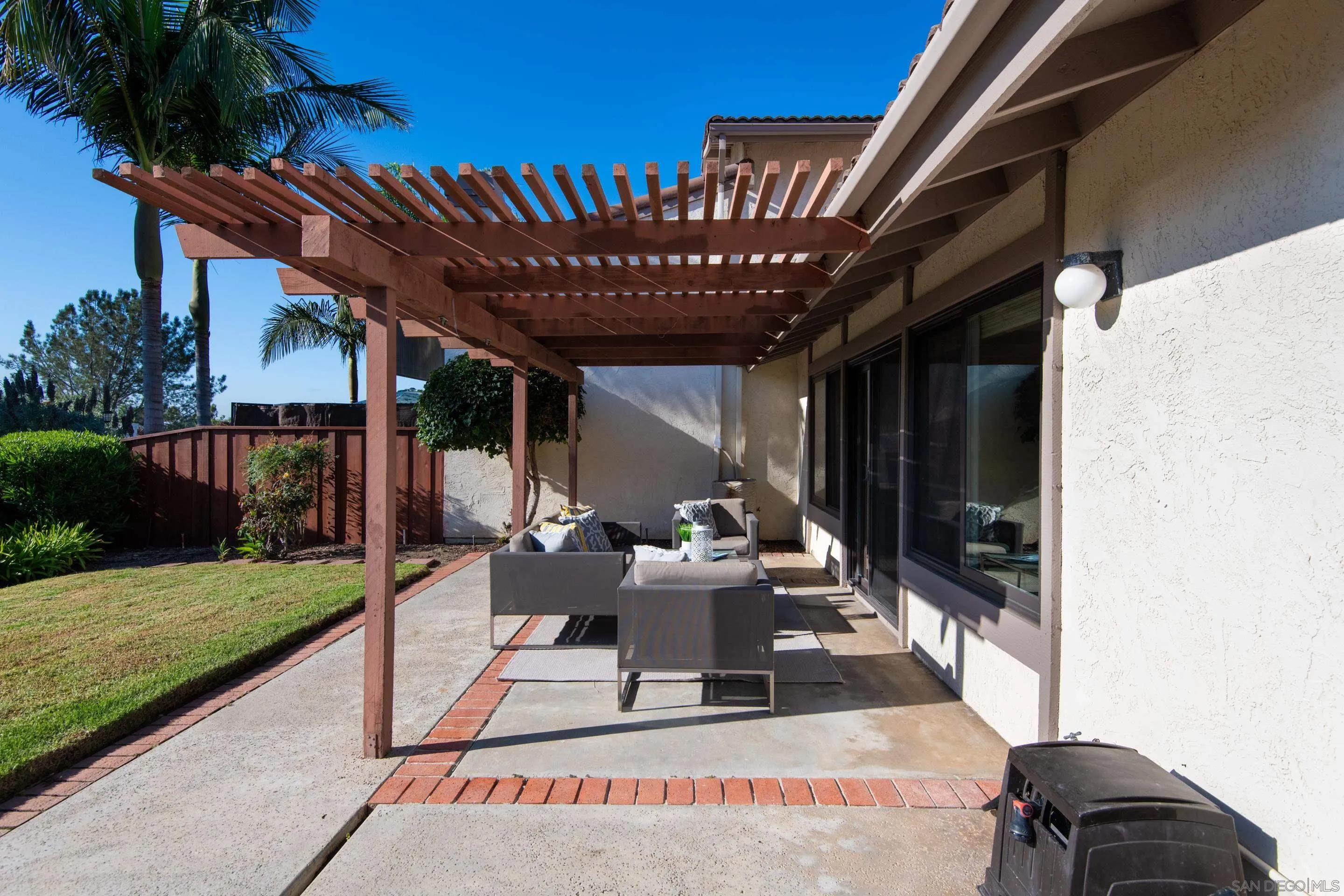 2002 Leafwood Place Encinitas, CA 92024 - Photo 32 of 64 a view of a porch with furniture and garden