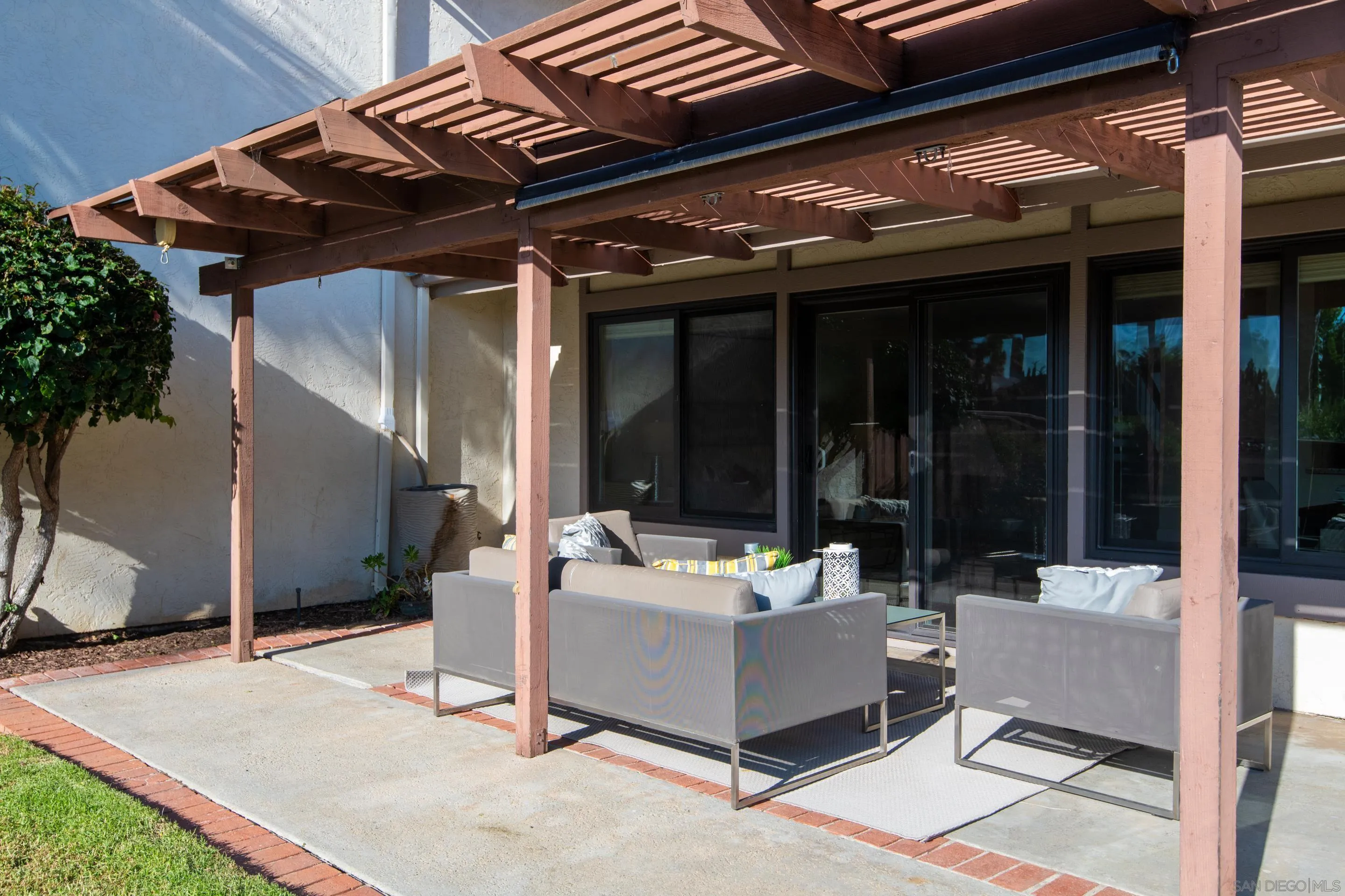 2002 Leafwood Place Encinitas, CA 92024 - Photo 33 of 64 a building outdoor space with patio furniture and potted plants