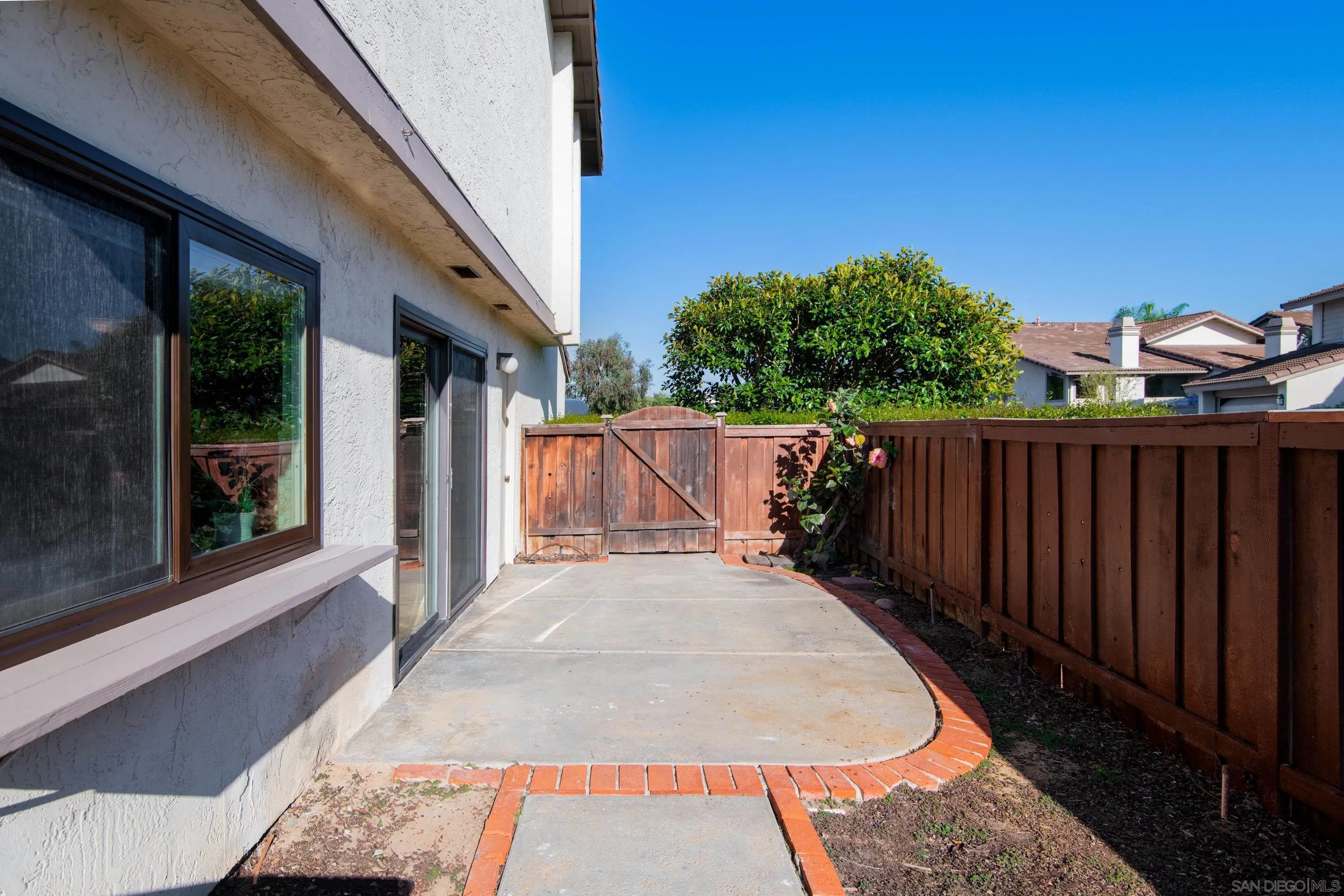 2002 Leafwood Place Encinitas, CA 92024 - Photo 38 of 64 a view of balcony with wooden floor and fence