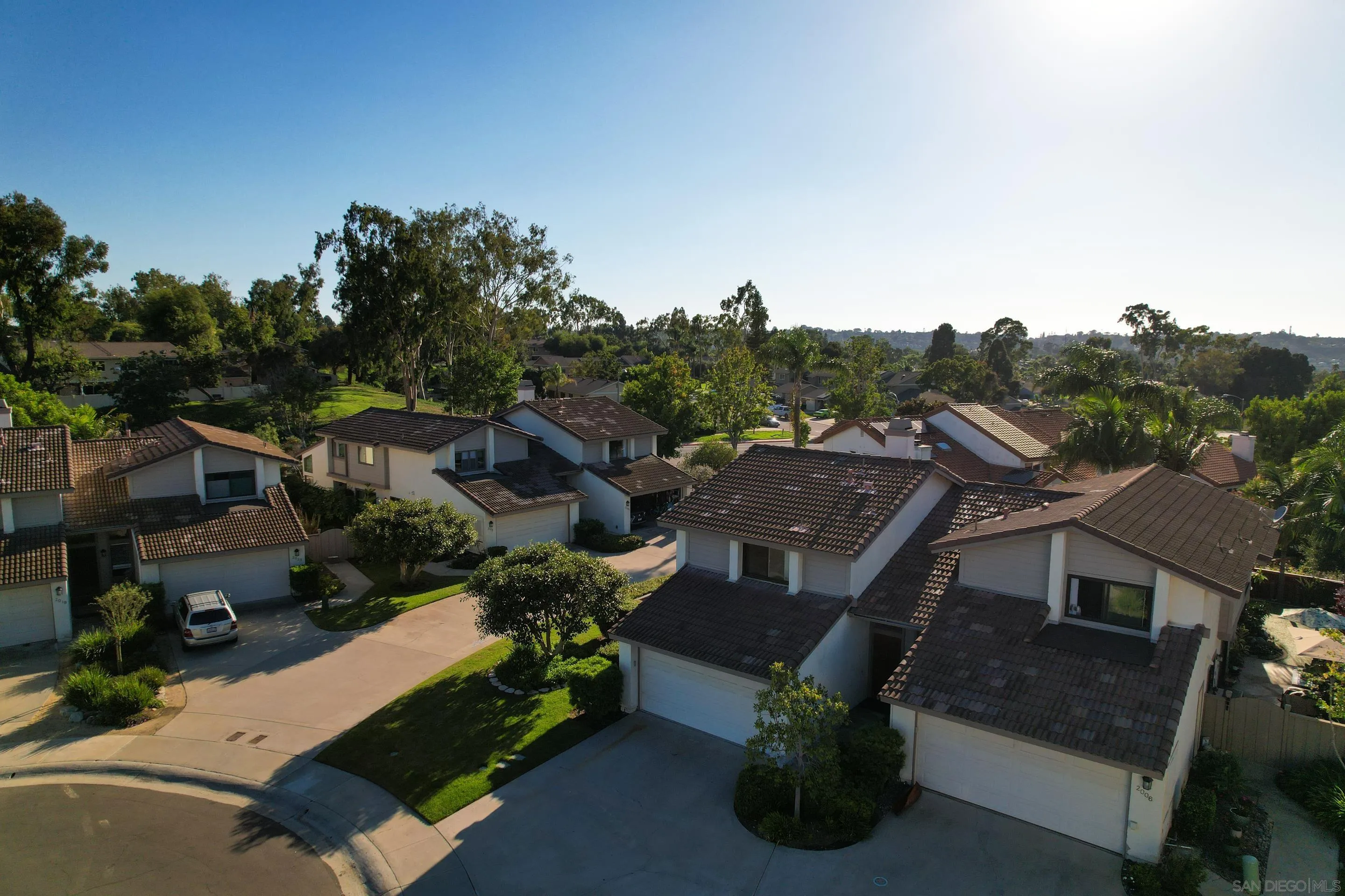 2002 Leafwood Place Encinitas, CA 92024 - Photo 44 of 64 an aerial view of multiple houses with a yard