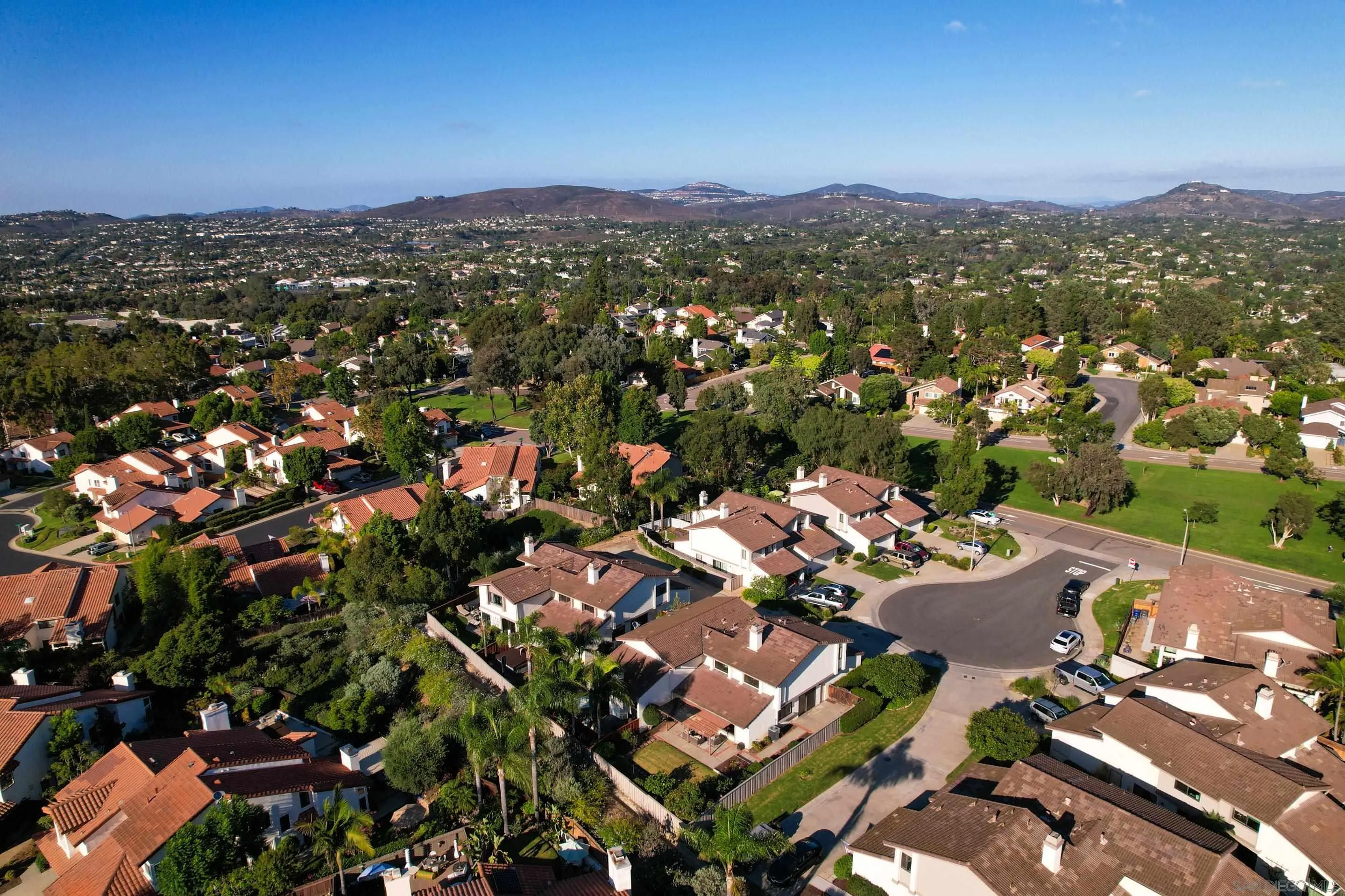 2002 Leafwood Place Encinitas, CA 92024 - Photo 50 of 64 an aerial view of a city with lots of residential buildings
