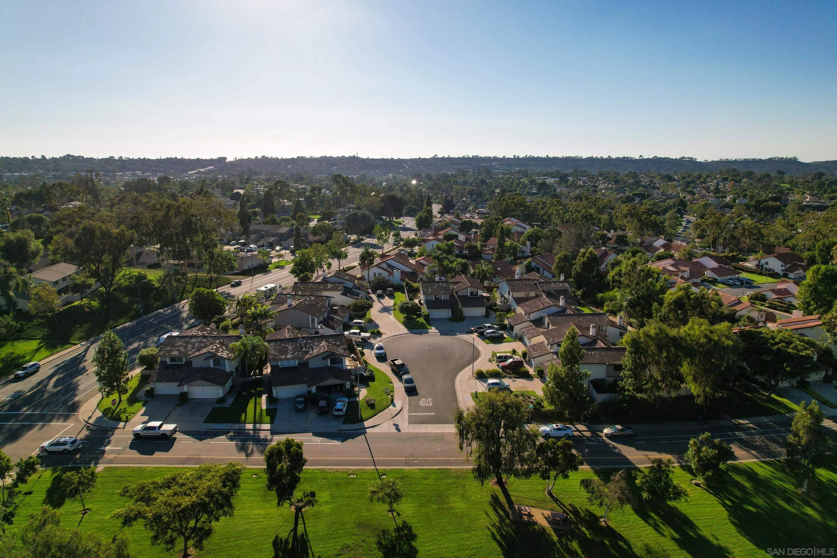 2002 Leafwood Place Encinitas, CA 92024 - Photo 55 of 64 an aerial view of residential house with parking and trees