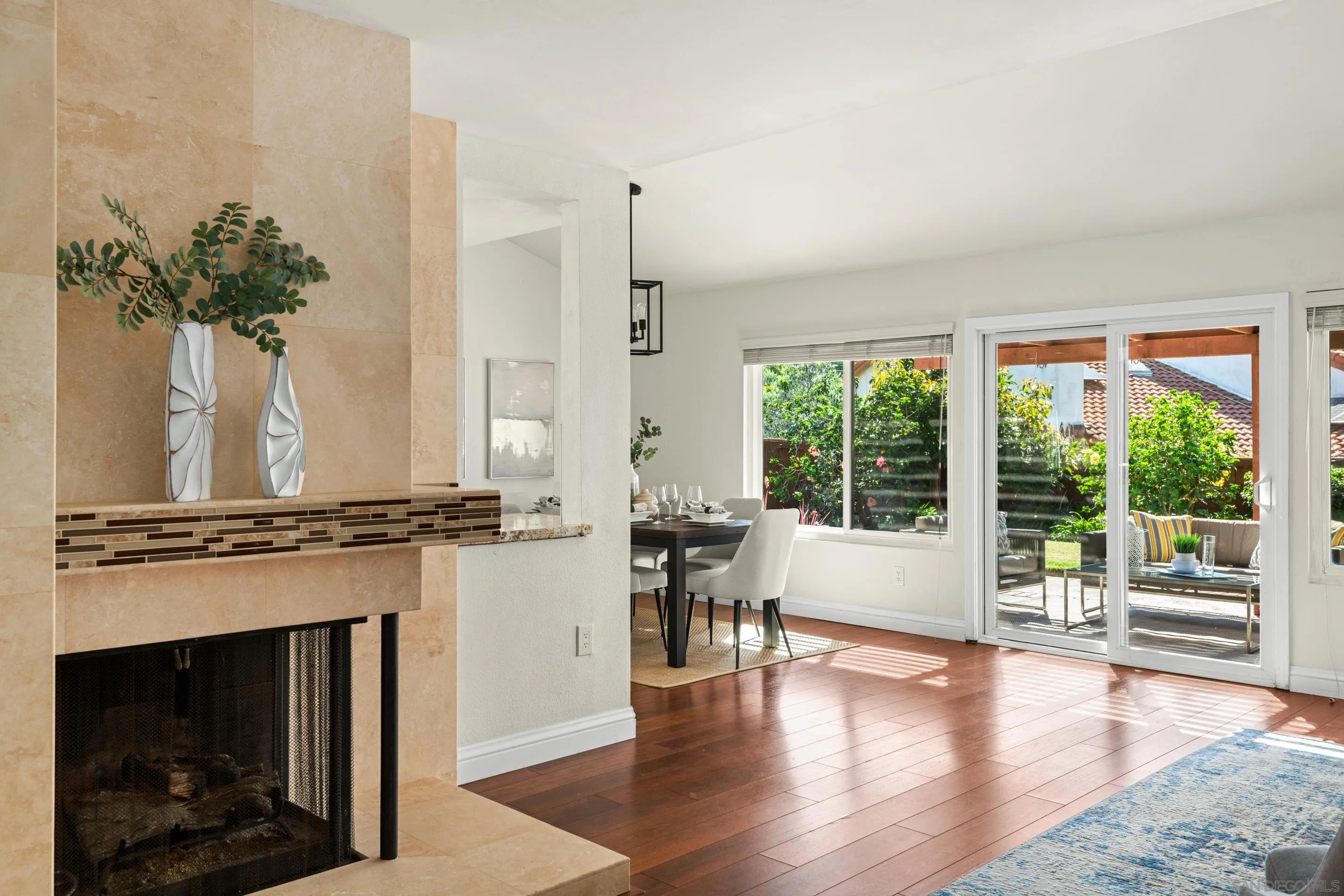 2002 Leafwood Place Encinitas, CA 92024 - Photo 8 of 64 a view of a livingroom with furniture wooden floor and windows