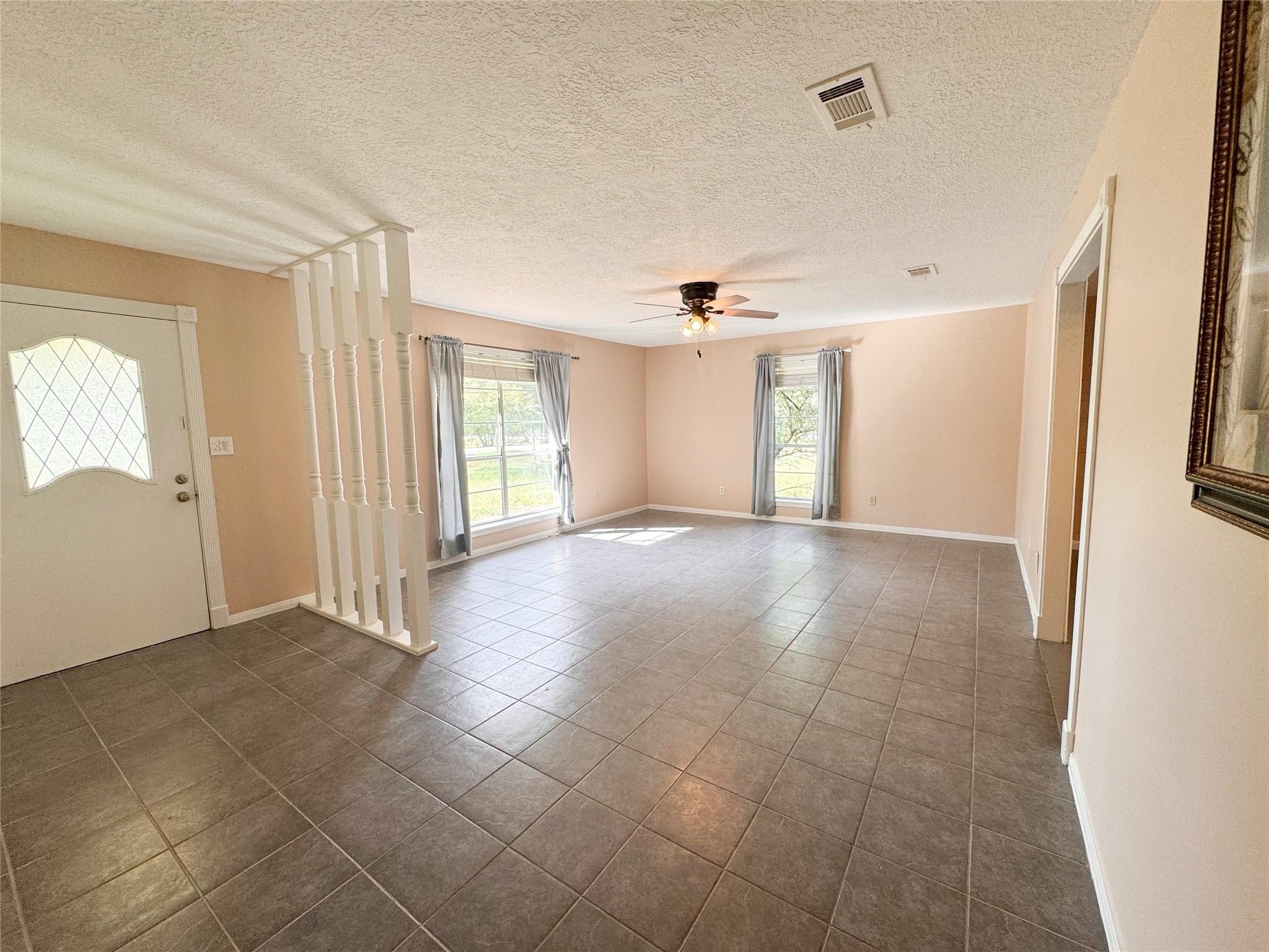 15331 Lake Lamond Road Conroe, TX 77384 - Photo 2 of 29 a view of livingroom with hardwood