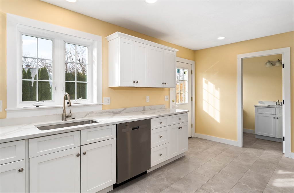 10 Glen Cove Place, Unit A Easthampton, MA 01027 - Photo 16 of 39 a kitchen with sink and cabinets