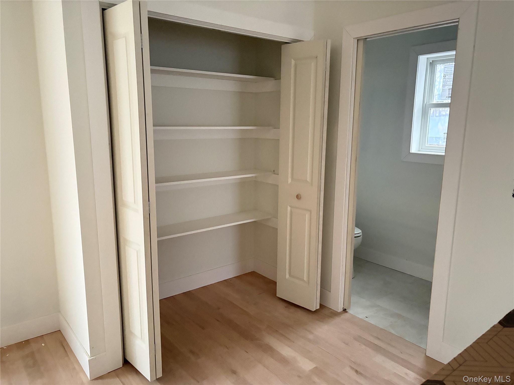 Tbd Devlin Road Highland, NY 12528 - Photo 6 of 18 a view of an empty room with wooden floor and a window