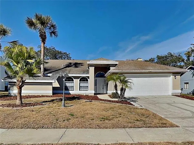 a house view with a garden space