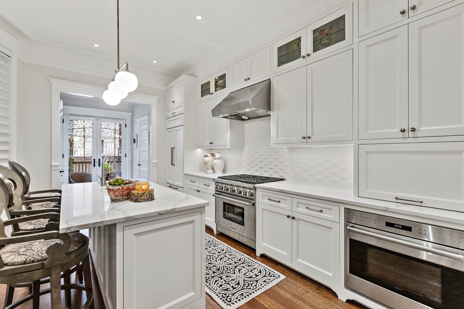 1304 North Ritchie Court Chicago, IL 60610 - Photo 16 of 39 a kitchen with stainless steel appliances a stove a sink and cabinets