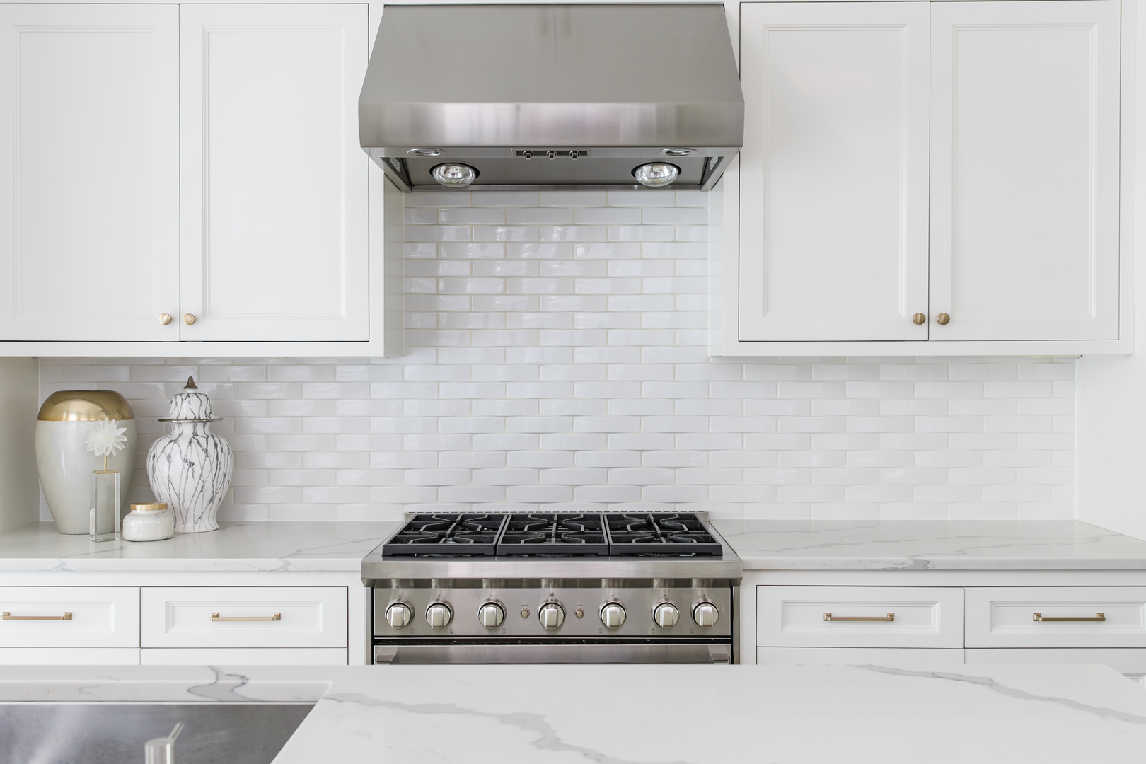 1304 North Ritchie Court Chicago, IL 60610 - Photo 17 of 39 a white stove top oven sitting inside of a kitchen