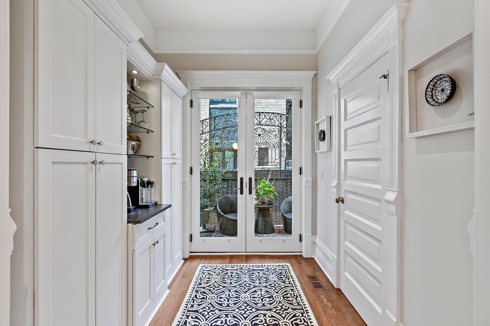 1304 North Ritchie Court Chicago, IL 60610 - Photo 21 of 39 a view of a hallway with windows and closet