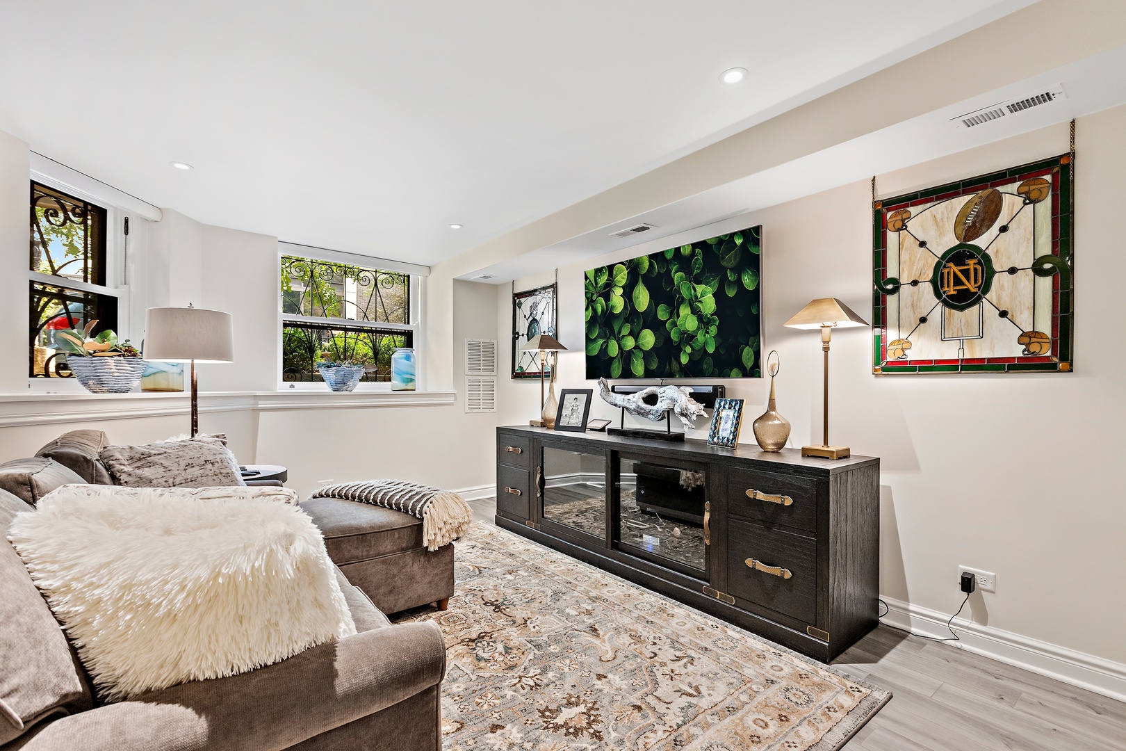 1304 North Ritchie Court Chicago, IL 60610 - Photo 35 of 39 a living room with furniture and a flat screen tv