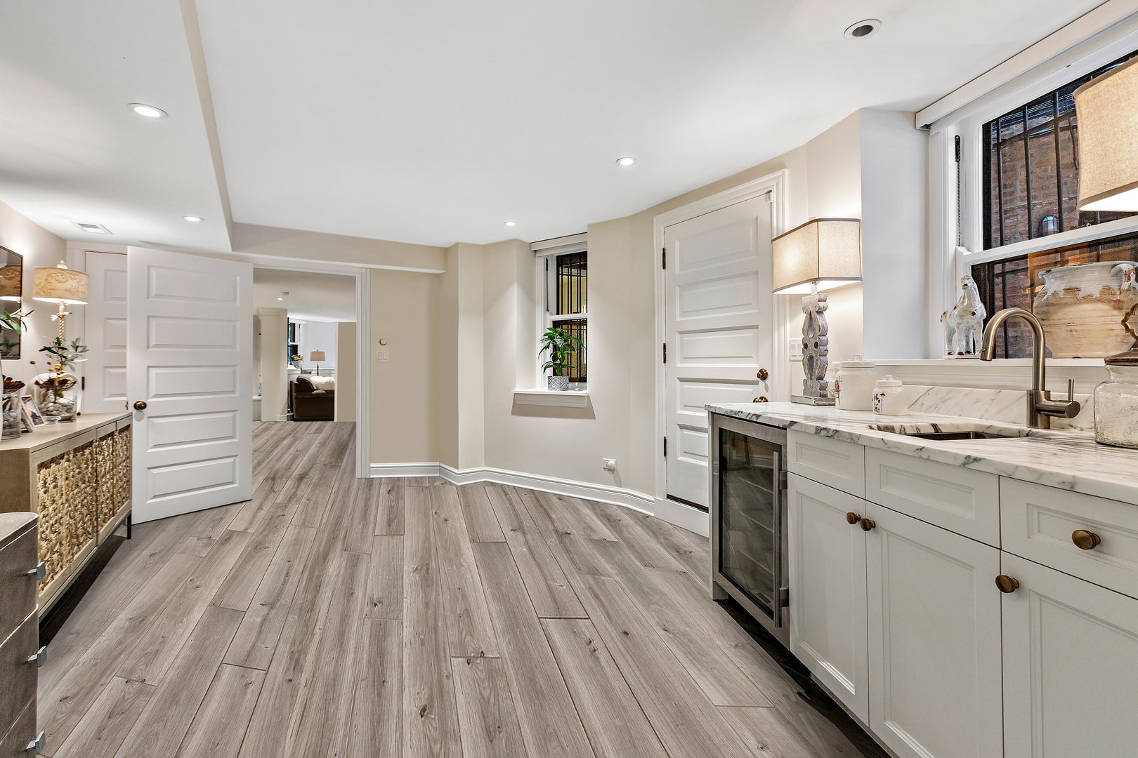 1304 North Ritchie Court Chicago, IL 60610 - Photo 37 of 39 a large kitchen with a lot of counter space and wooden floor
