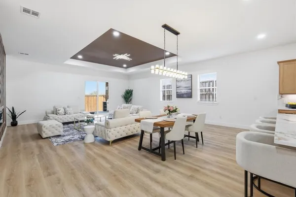 a living room with furniture or window and a table