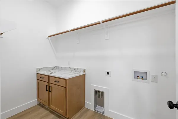 a utility room with washer and dryer