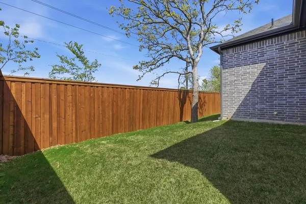 a view of a backyard with a garden