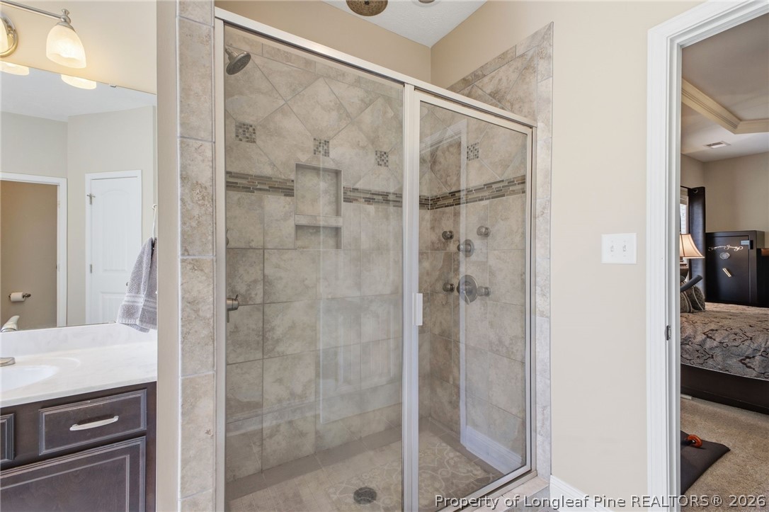 2589 June Johnson Road Raeford, NC 28376 - Photo 20 of 49 a bathroom with a shower and a sink