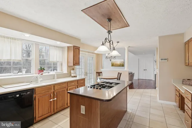 a bedroom with a bed and a table in it