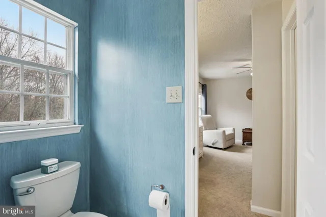 a bathroom with double sink and a mirror