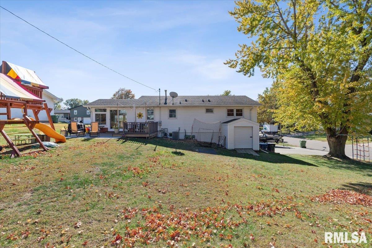 1146 6th Avenue North Clinton, IA 52732 - Photo 7 of 27 a swimming pool view with a outdoor seating