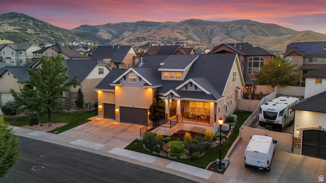 14738 Tangle Hill Road Herriman, UT 84096 - Photo 2 of 66 Contemporary two-story residence with a covered front porch and stone accents