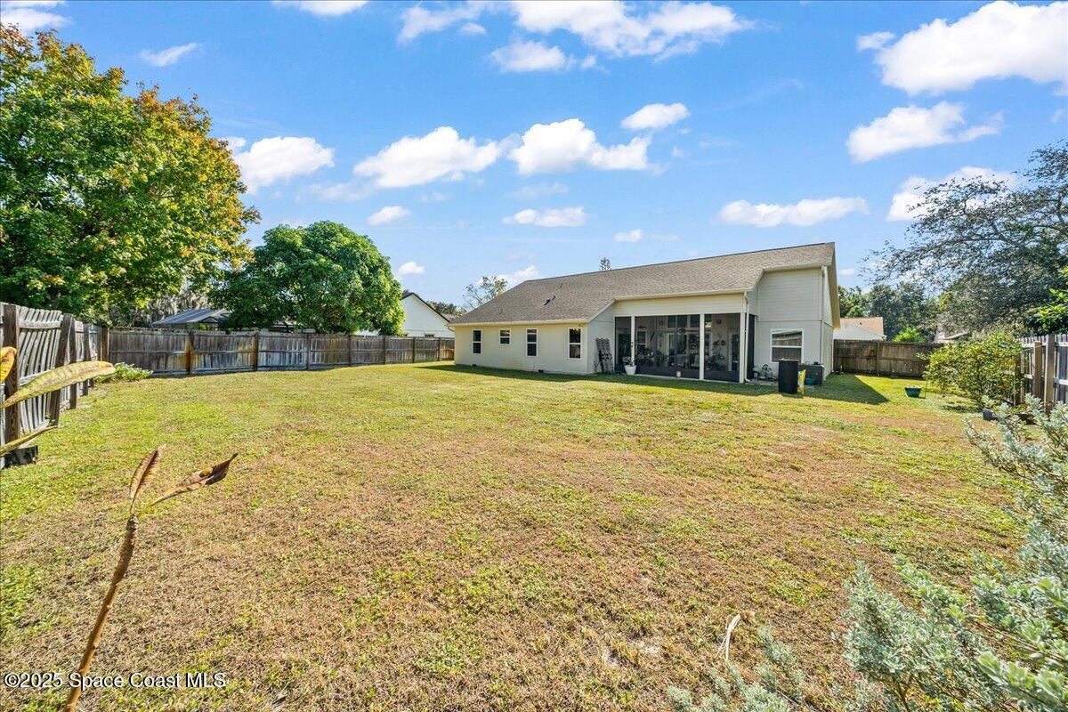 910 Brookshire Circle Malabar, FL 32950 - Photo 25 of 29 a view of house with swimming pool