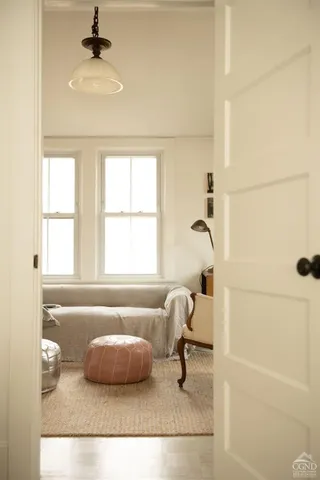 a view of a livingroom with furniture and a couch
