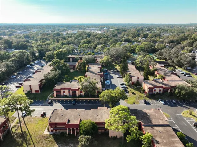 an aerial view of a city with lots of residential buildings