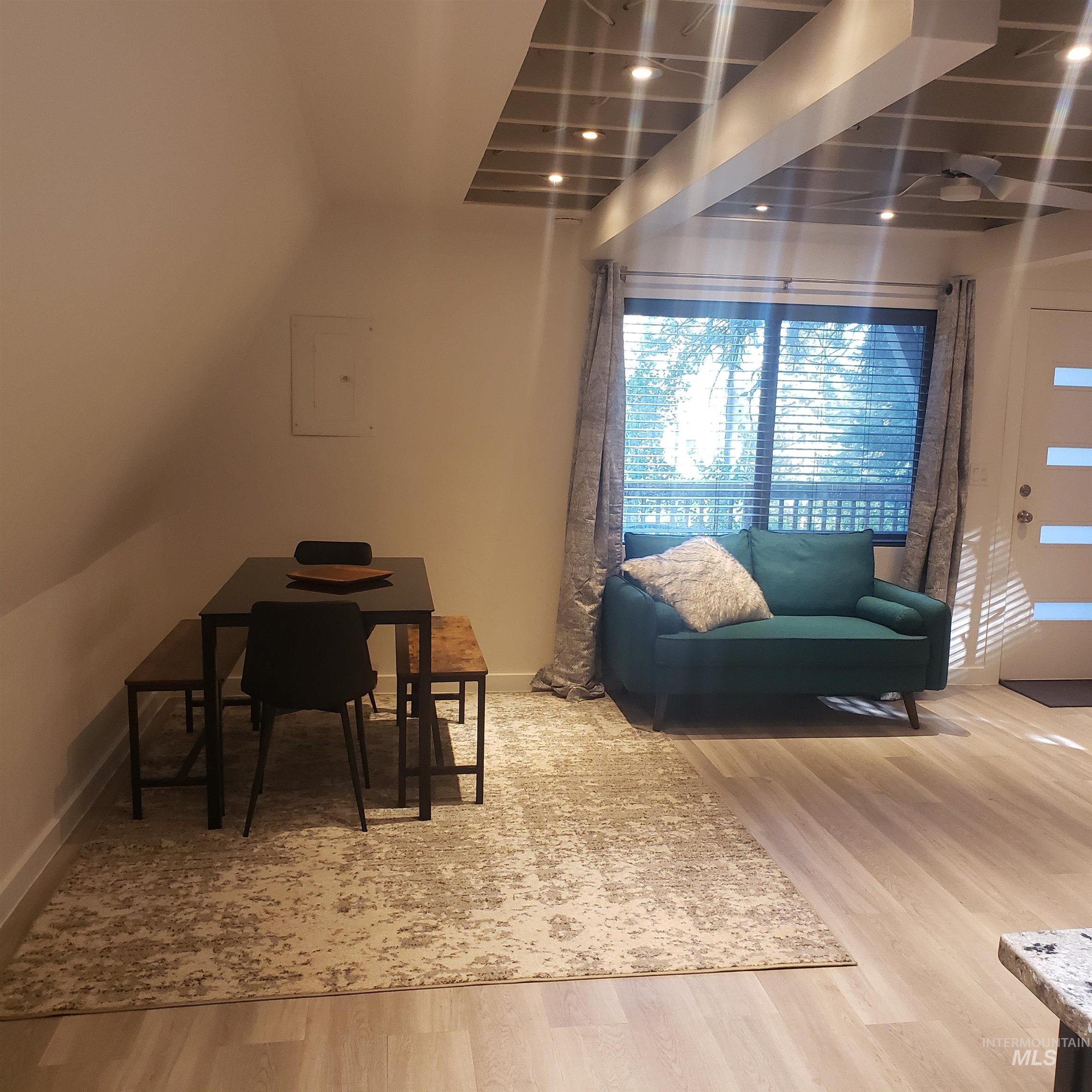1098 Crescent Rim Drive McCall, ID 83638 - Photo 17 of 42 Living room featuring light wood-style floors and electric panel