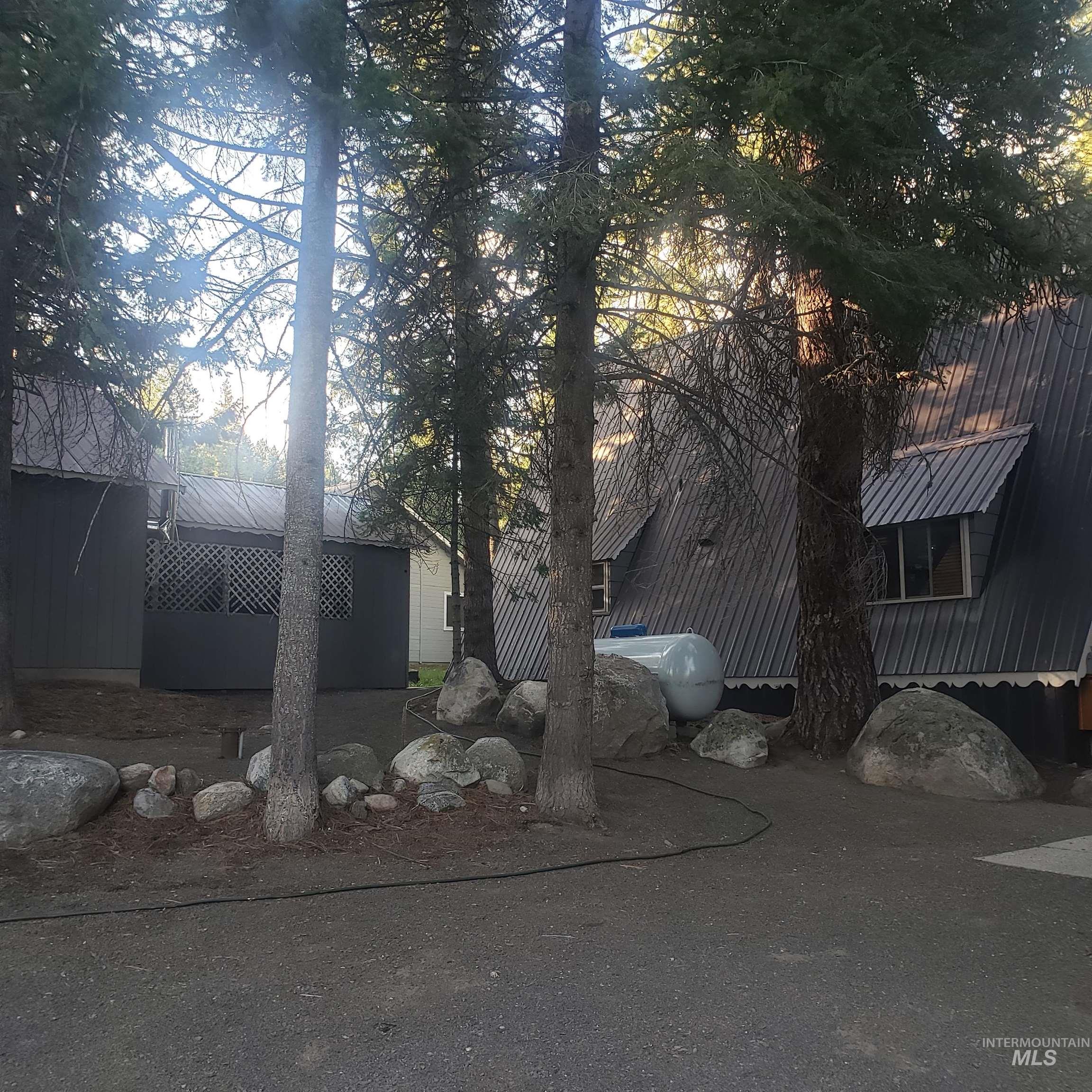 1098 Crescent Rim Drive McCall, ID 83638 - Photo 31 of 42 View of property exterior featuring a metal roof