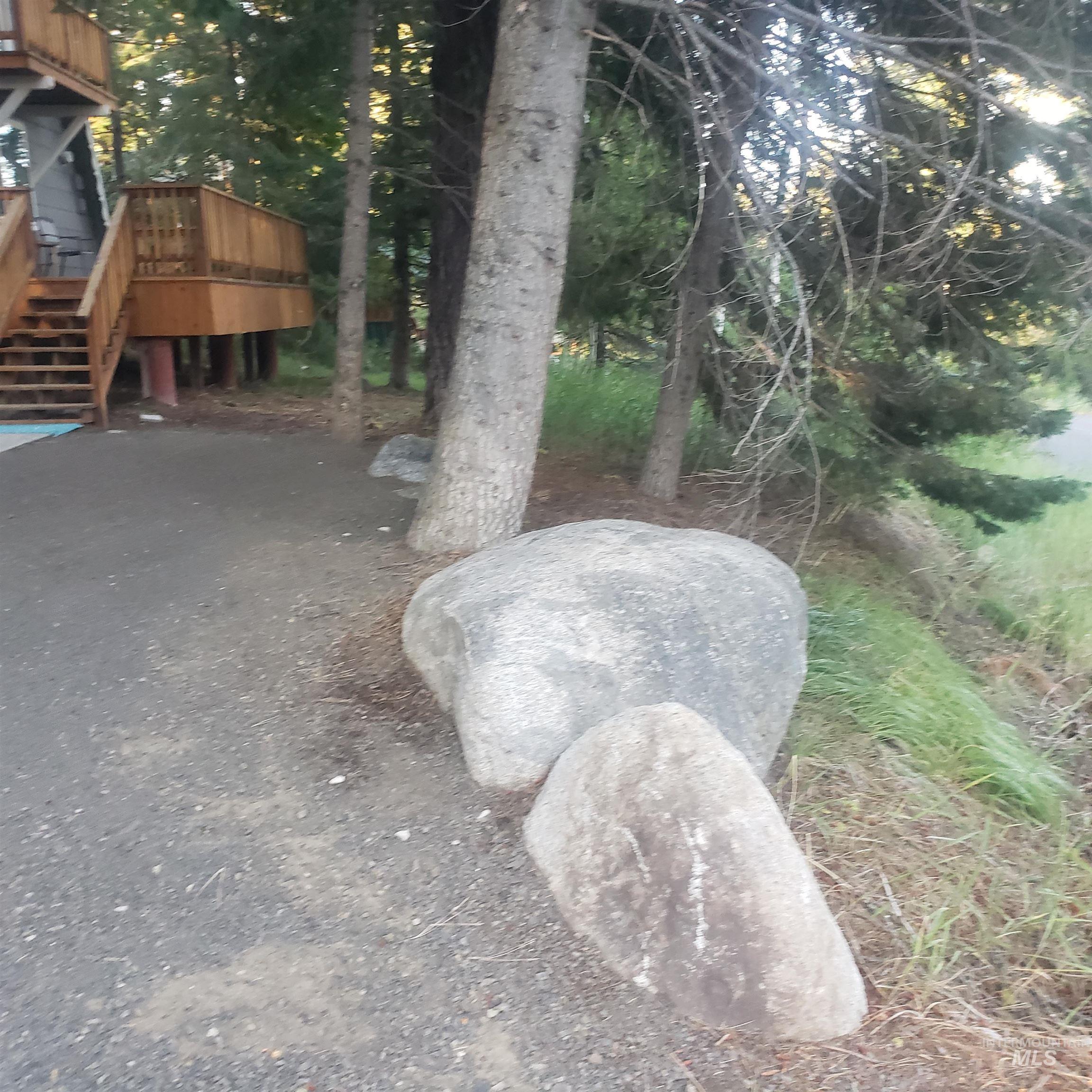 1098 Crescent Rim Drive McCall, ID 83638 - Photo 33 of 42 View of yard featuring stairs and a deck