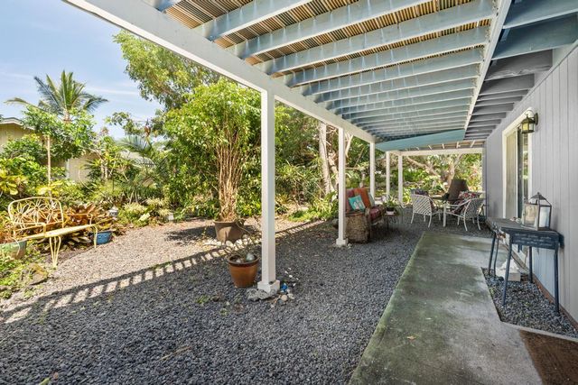 a view of a porch with furniture
