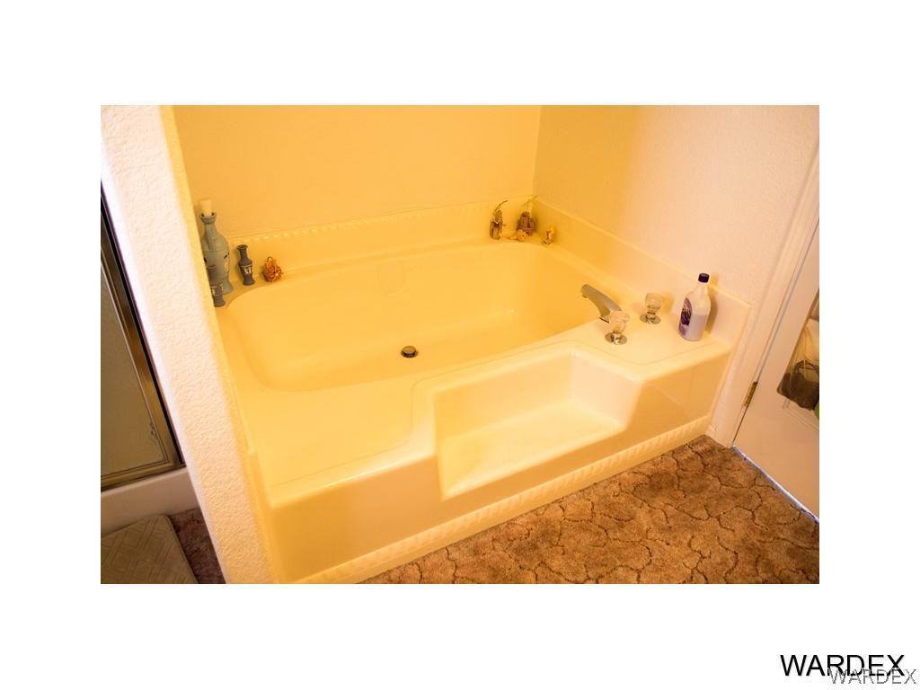 4117 Cove Road Golden Valley, AZ 86413 - Photo 19 of 32 a bathroom with a sink