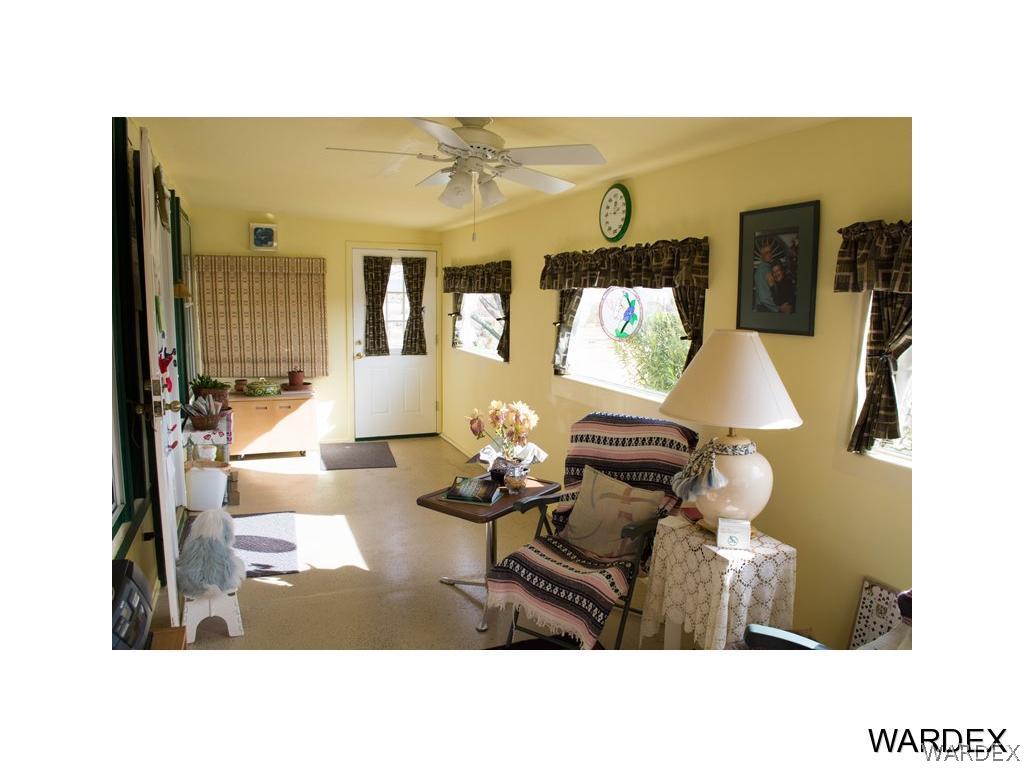 4117 Cove Road Golden Valley, AZ 86413 - Photo 22 of 32 a living room with furniture and wooden floor