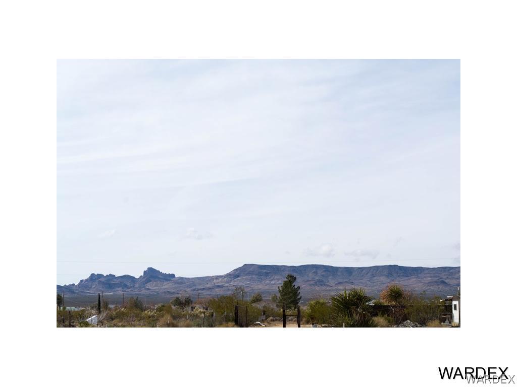 4117 Cove Road Golden Valley, AZ 86413 - Photo 31 of 32 a picture of a person on a field