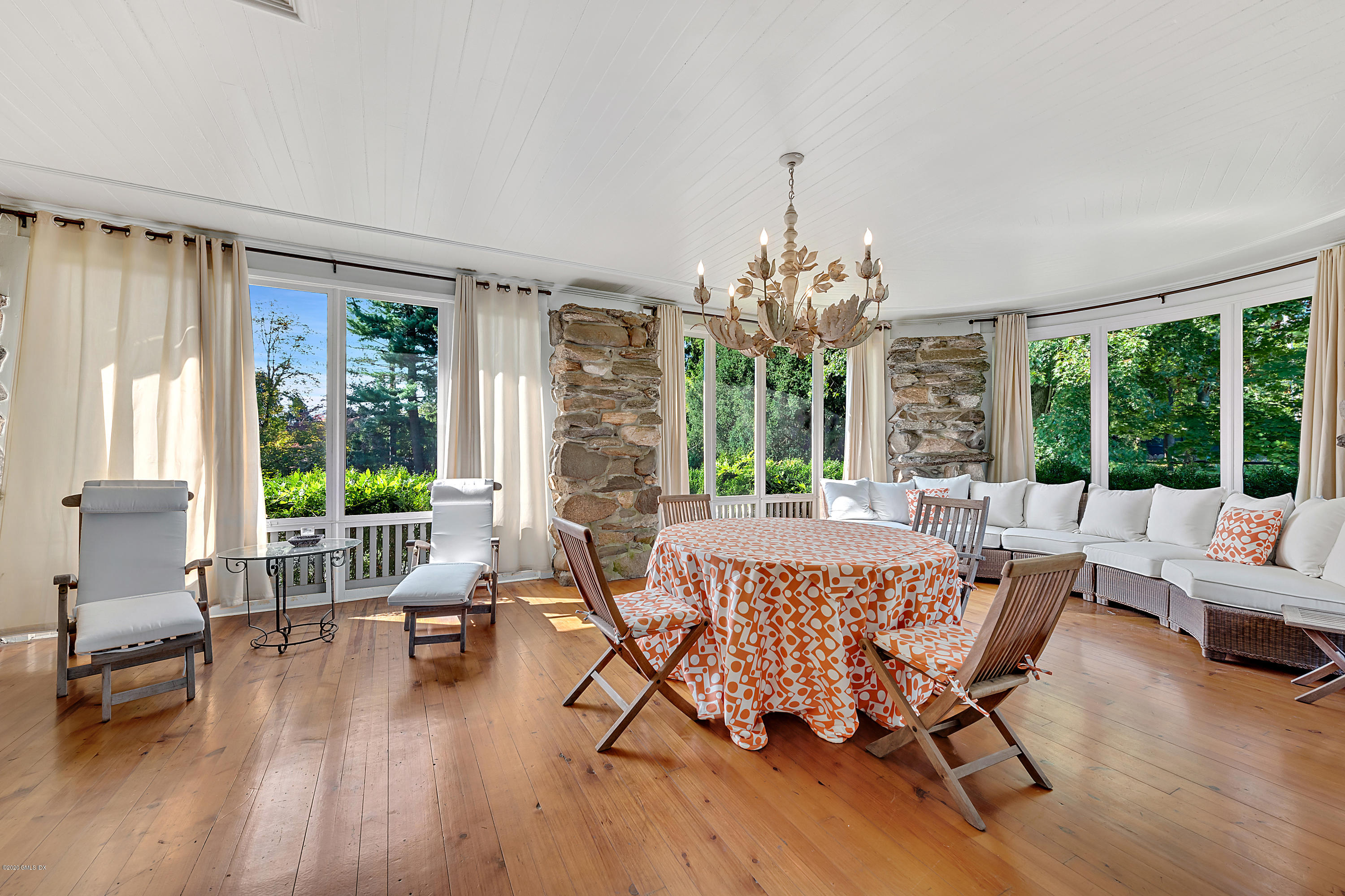 3 Fairfield Road Greenwich, CT 06830 - Photo 11 of 46 a living room with furniture and a large window