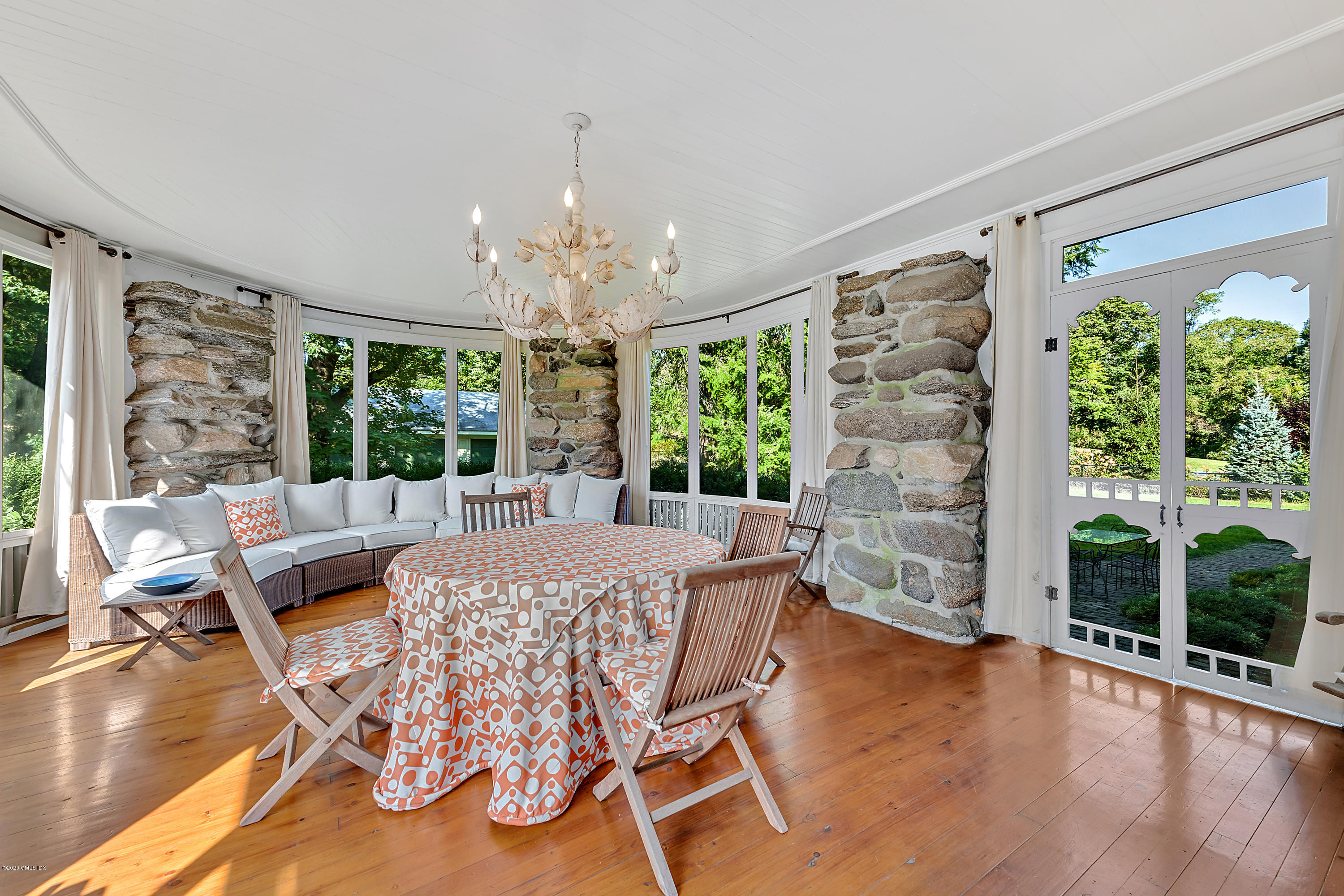 3 Fairfield Road Greenwich, CT 06830 - Photo 12 of 46 a view of a dining room with furniture wooden floor and chandelier