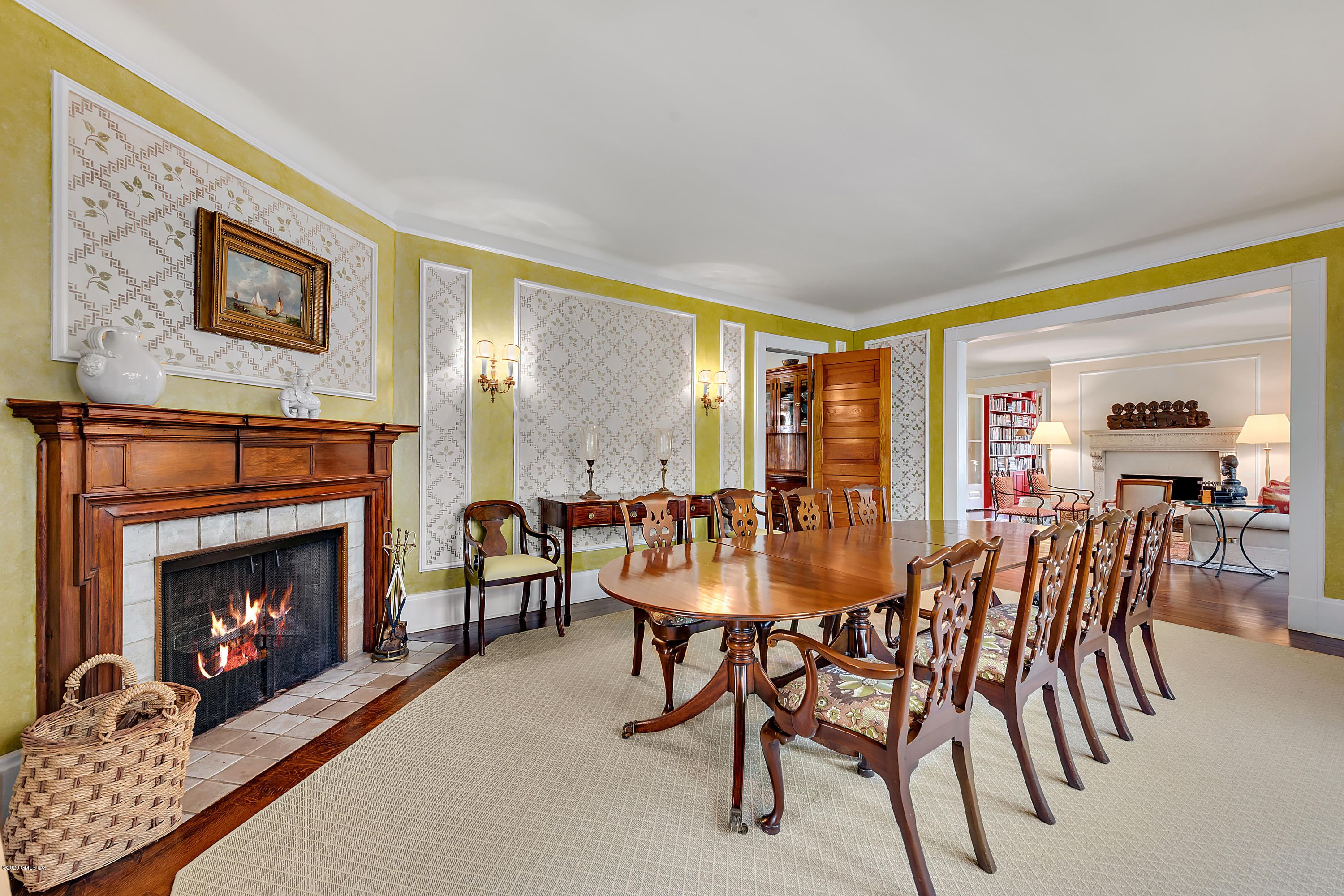 3 Fairfield Road Greenwich, CT 06830 - Photo 14 of 46 a view of a livingroom with furniture and a fireplace