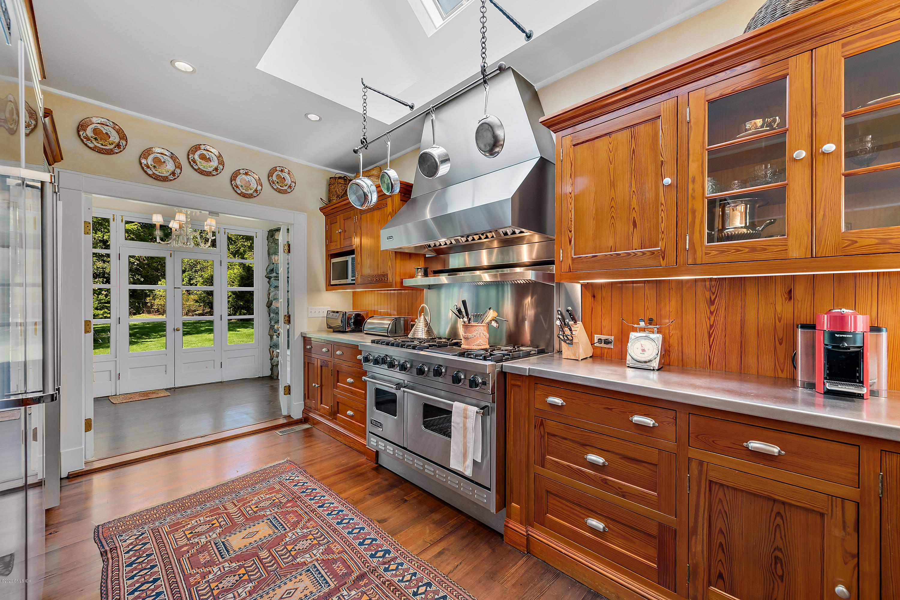 3 Fairfield Road Greenwich, CT 06830 - Photo 19 of 46 a kitchen with stainless steel appliances granite countertop a stove and a sink