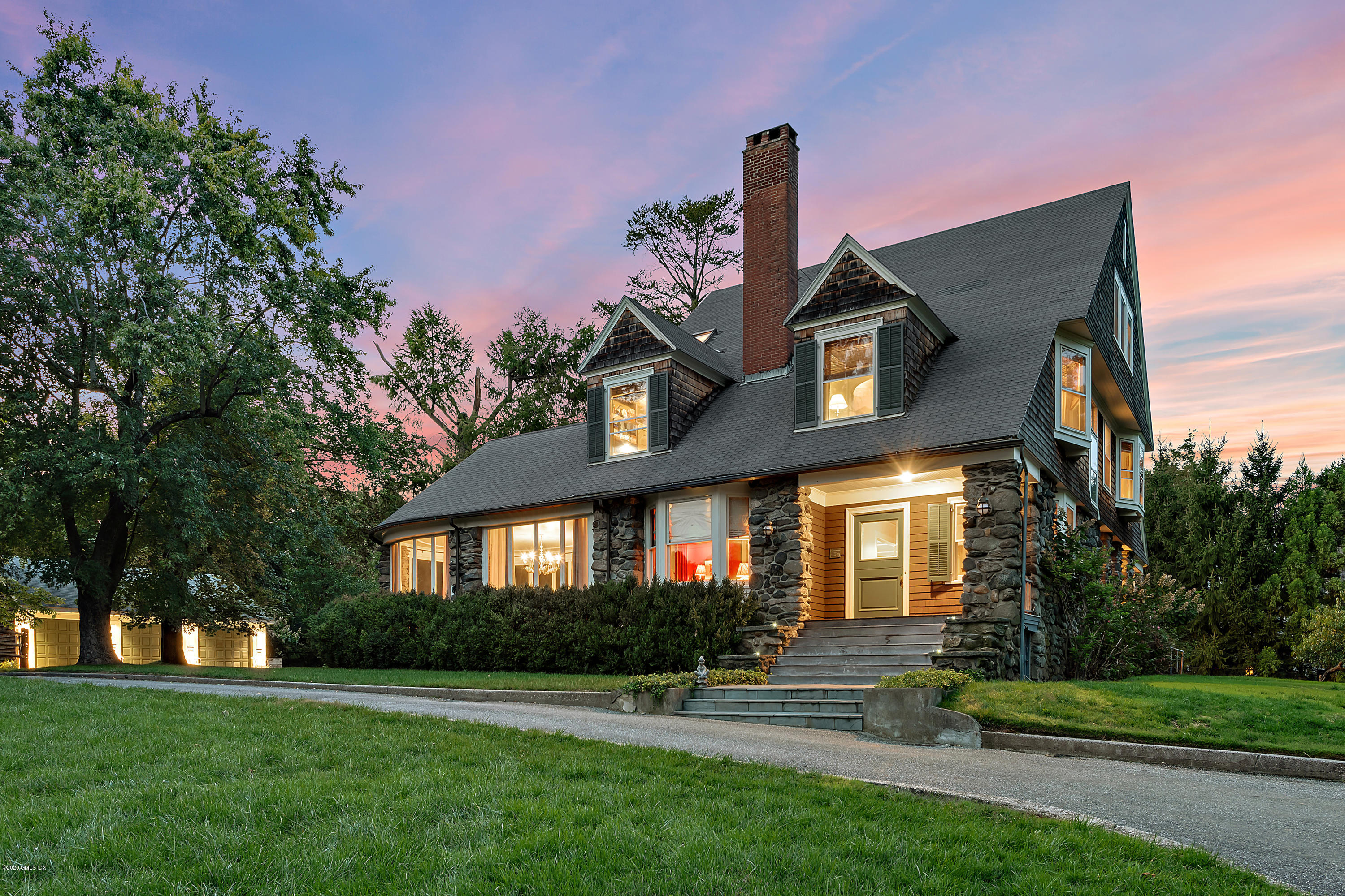 3 Fairfield Road Greenwich, CT 06830 - Photo 34 of 46 a front view of a house with a yard
