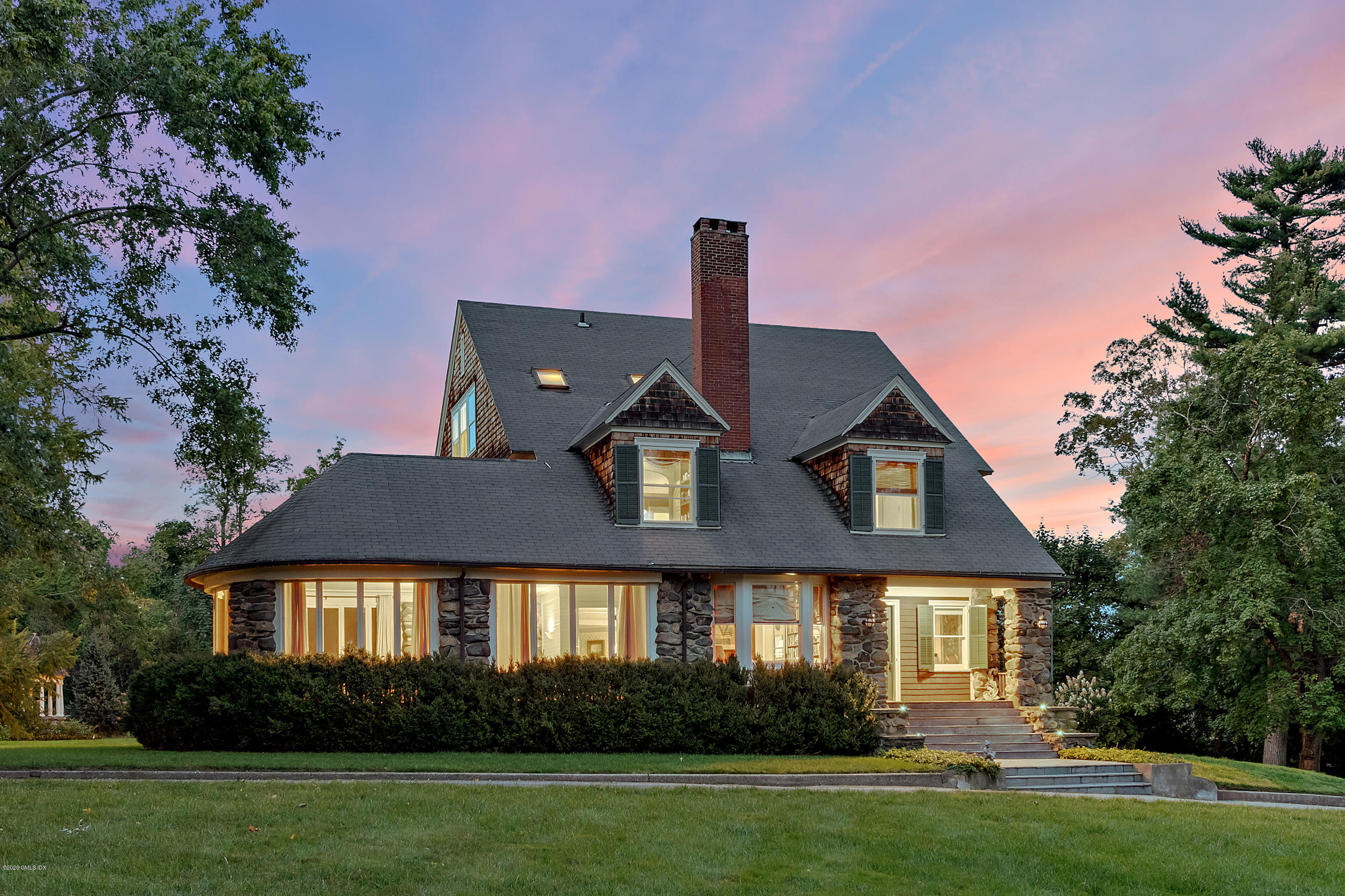 3 Fairfield Road Greenwich, CT 06830 - Photo 35 of 46 a front view of a house with a yard