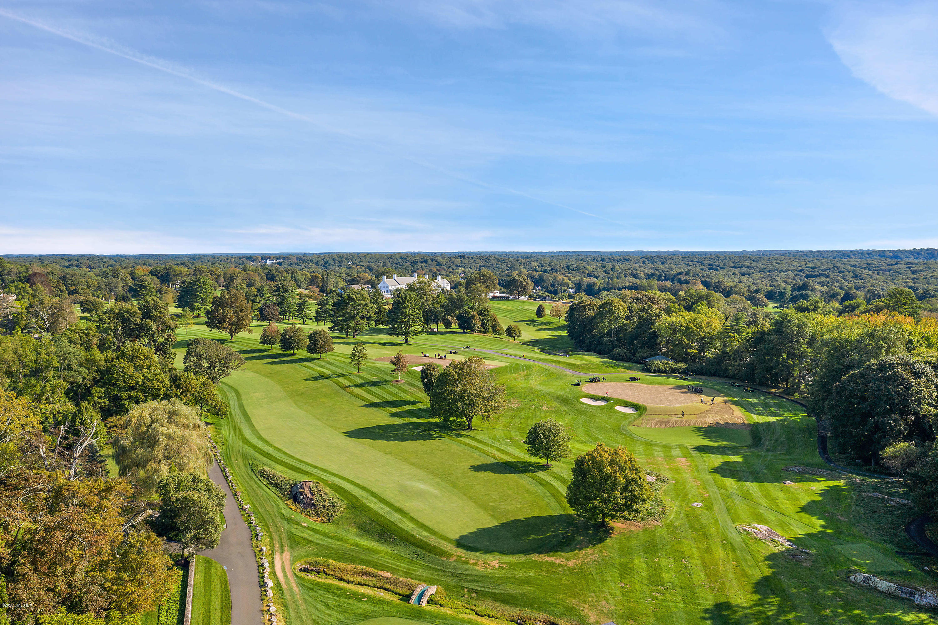 3 Fairfield Road Greenwich, CT 06830 - Photo 41 of 46 a view of a swimming pool with a yard