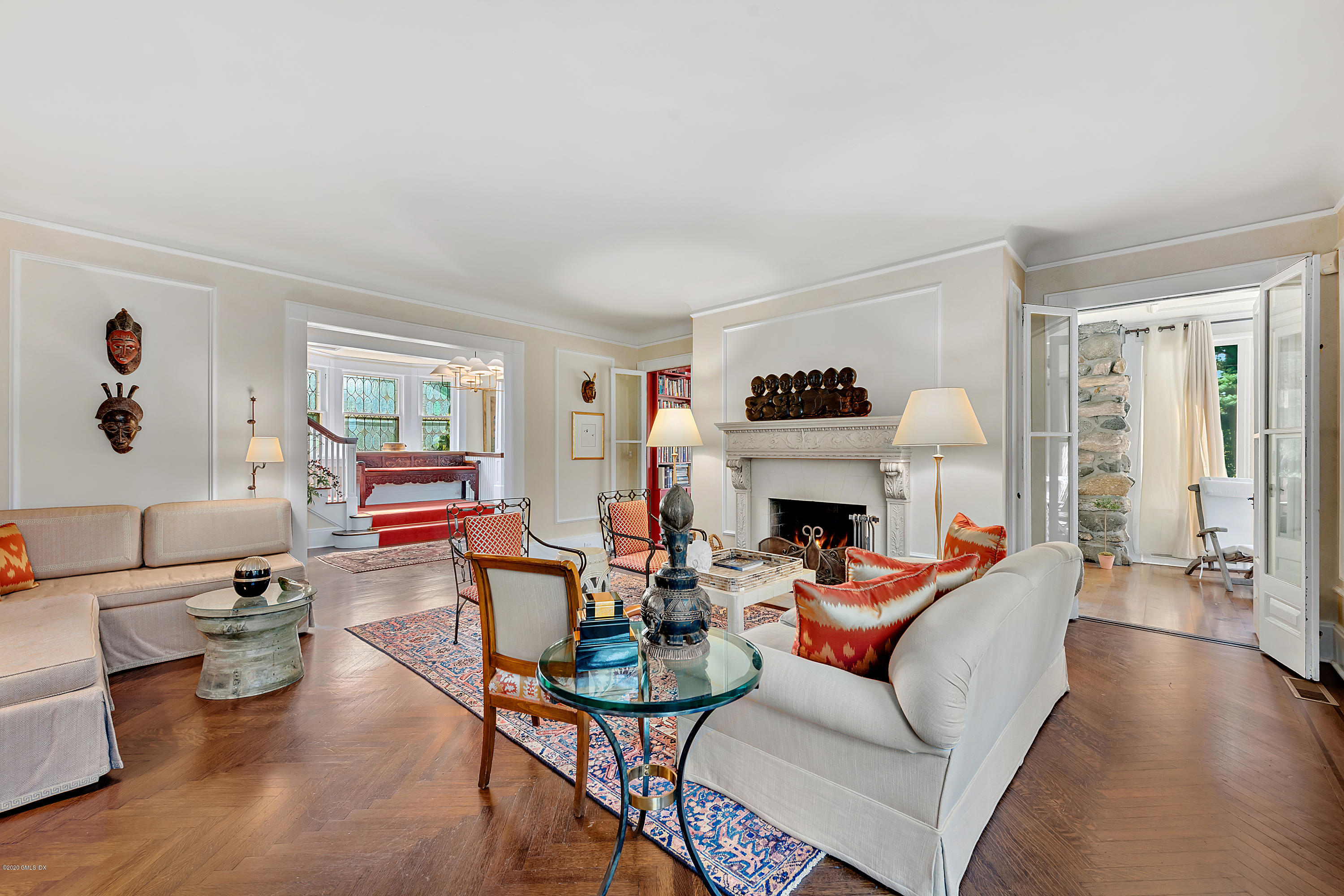 3 Fairfield Road Greenwich, CT 06830 - Photo 7 of 46 a living room with fireplace furniture and a large window