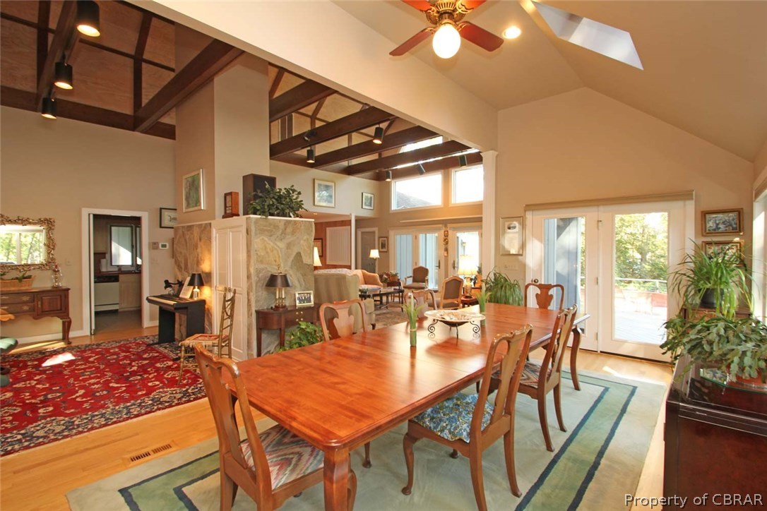 508 Rio Vista Weems, VA 22576 - Photo 23 of 50 Formal Dining Room open to the Living Room & the sitting area with great views & deck access