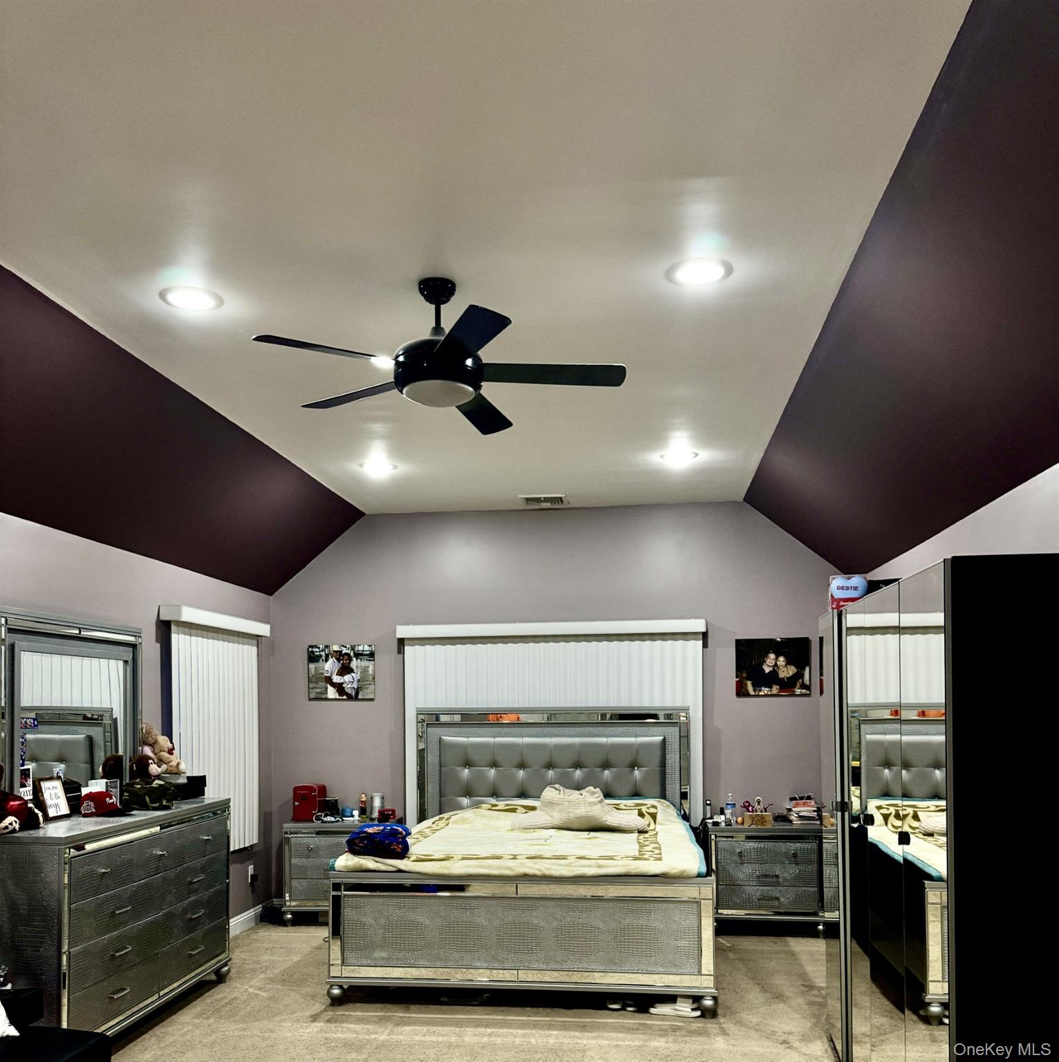 285 Daniel Street Lindenhurst, NY 11757 - Photo 13 of 15 a living room with furniture and a flat screen tv