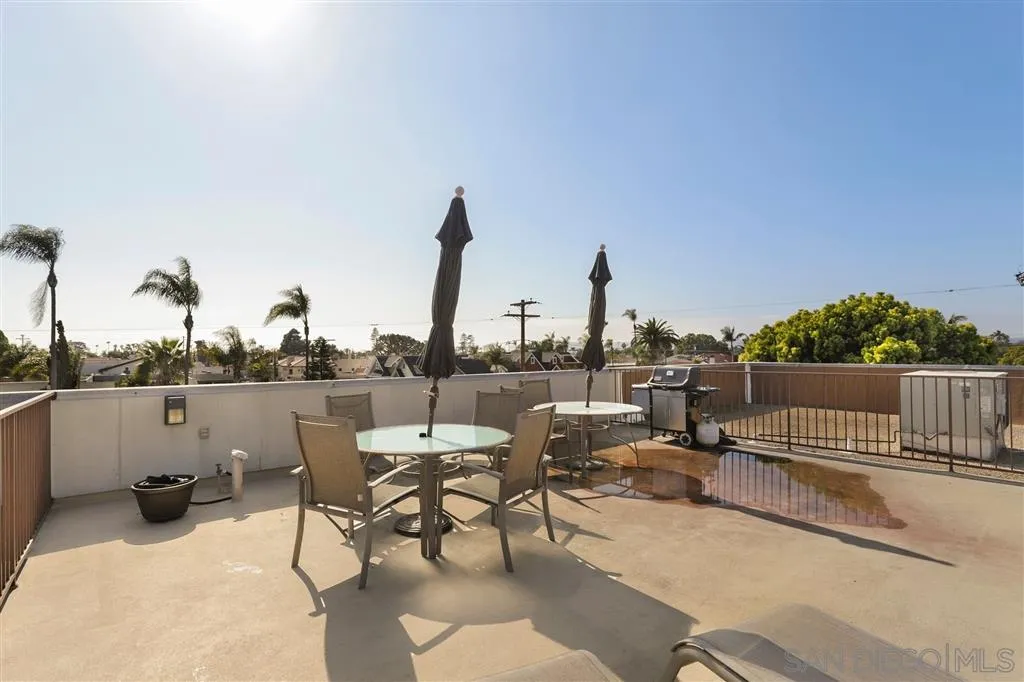 864 E Avenue Coronado, CA 92118 - Photo 16 of 20 a terrace with outdoor seating and city view