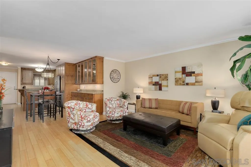 864 E Avenue Coronado, CA 92118 - Photo 2 of 20 a living room with furniture and wooden floor