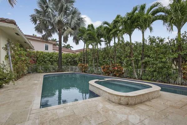 a view of swimming pool from a balcony