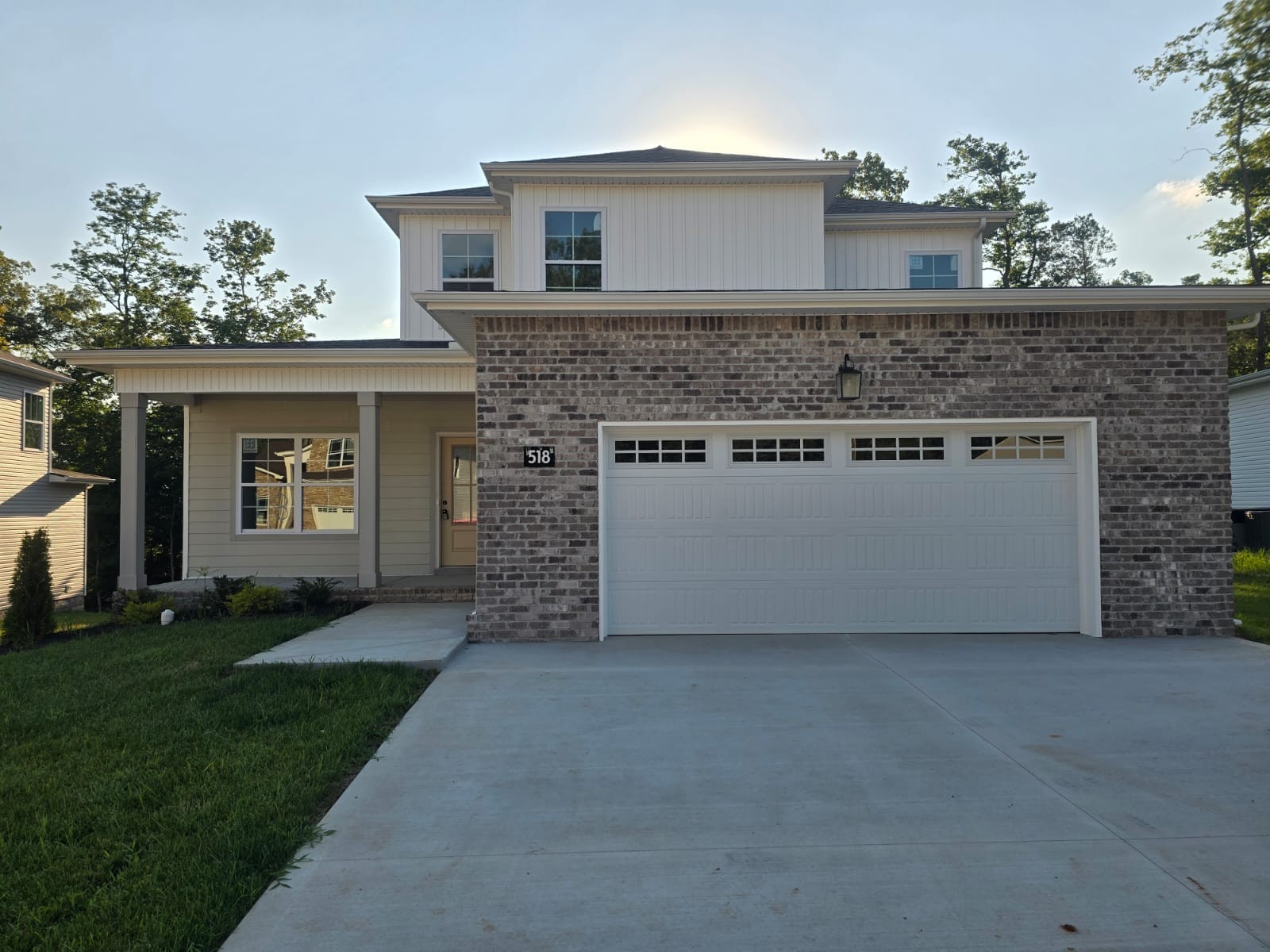 522 North Halifax Court Clarksville, TN 37040 - Photo 1 of 20 a front view of a house with a garden