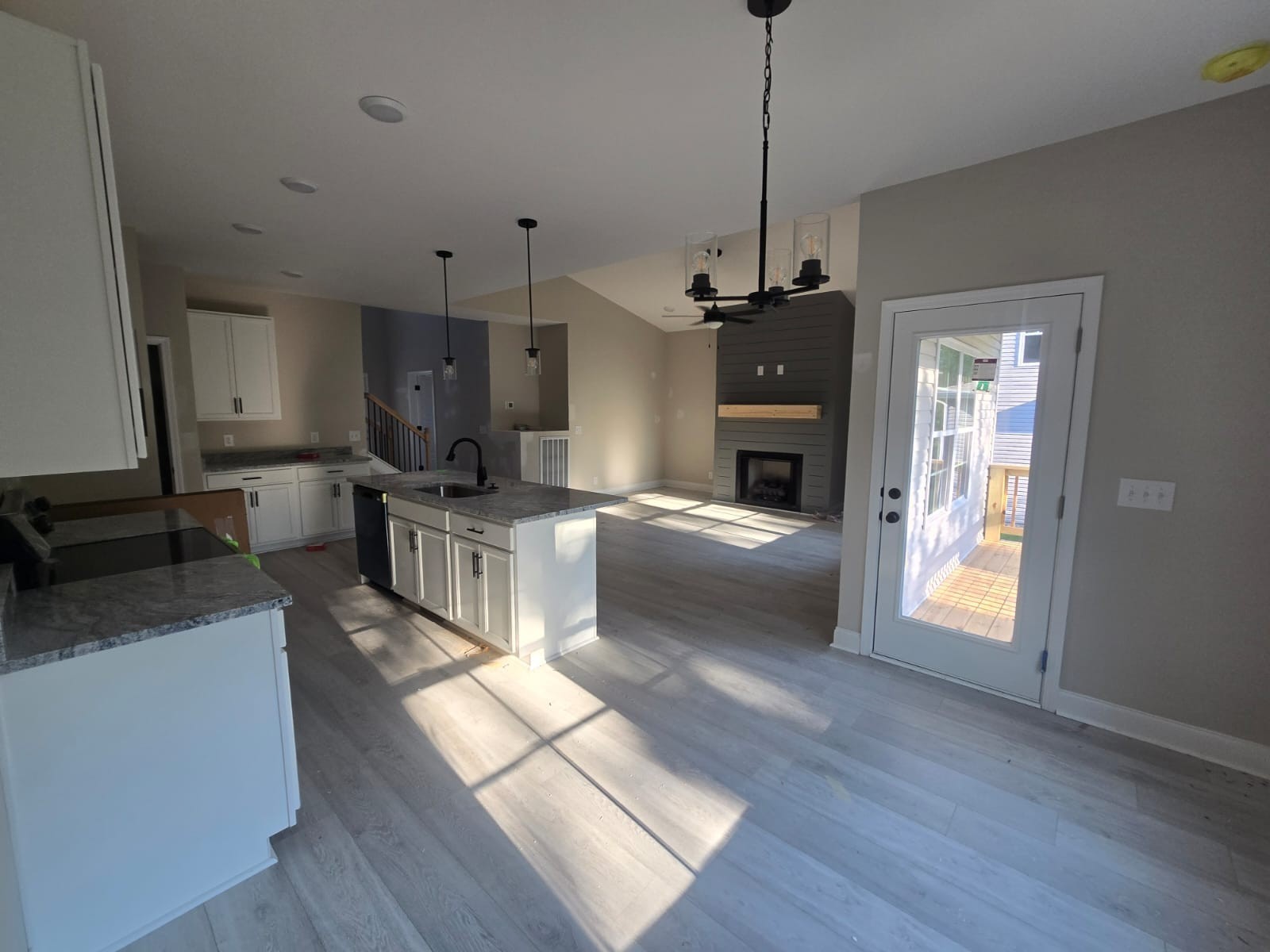 522 North Halifax Court Clarksville, TN 37040 - Photo 8 of 20 a kitchen with stainless steel appliances granite countertop a refrigerator a oven a stove and a wooden floors